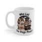 A white glossy mug featuring eleven pouting dogs. Text in black reads - 'Who Let The Dogs Pout?'