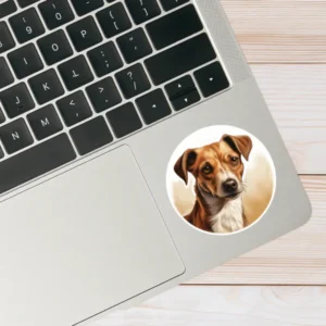 An image of a Jack Russell sticker situated on a laptop computer