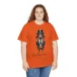 Long haired woman wearing an orange funny sausage dog t-shirt